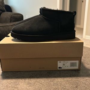 Black UGG ultra mini boot, size 8, never worn